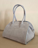 Pochette scamosciata