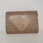 Mini bag in micro glitter oro. La amerai se ti piacciono le bag chic per i tuoi look più belli!  Misure: 19x13x5,5cm  Delizioso nuovo arrivo!